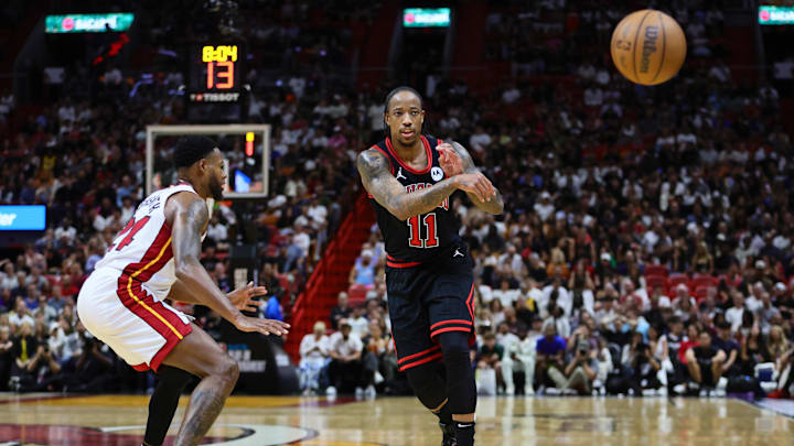 Apr 19, 2024; Miami, Florida, USA; Chicago Bulls forward DeMar DeRozan (11) passes the basketball against the Miami Heat: Sam Navarro-USA TODAY Sports