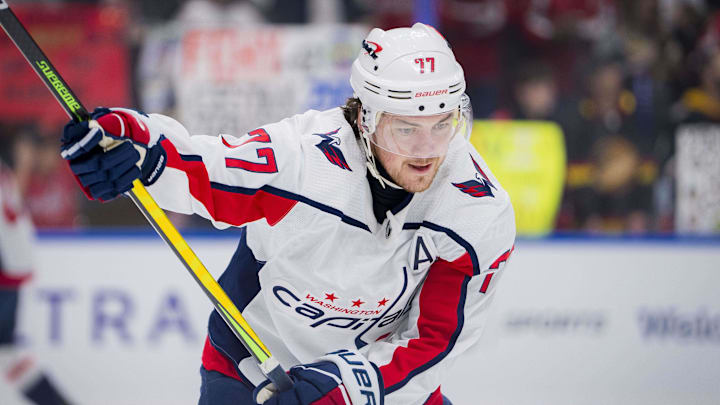 Mar 16, 2024; Vancouver, British Columbia, CAN; Washington Capitals forward TJ Oshie (77) shoots during warm up prior to a game against the Vancouver Canucks at Rogers Arena.  Mandatory Credit: Bob Frid-Imagn Images