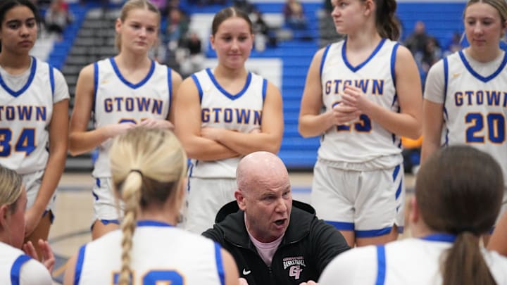 Germantown girls basketball coach Matt Stuve talks with players during the game at home against Brookfield East in January.