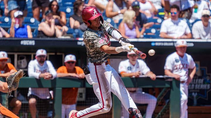 Jun 14, 2026; Omaha, NE, USA; Alabama Crimson Tide shortstop Justin Lebron (1) hits a single against the Texas Longhorns during the third inning at Charles Schwab Field. Mandatory Credit: Dylan Widger-Imagn Images Jun 14, 2026; Omaha, NE, USA; Alabama Crimson Tide shortstop Justin Lebron (1) hits a single against the Texas Longhorns during the third inning at Charles Schwab Field. Mandatory Credit: Dylan Widger-Imagn Images