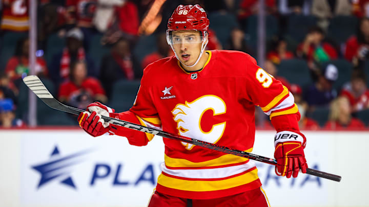 Oct 12, 2024; Calgary, Alberta, CAN; Calgary Flames left wing Andrei Kuzmenko (96) during the face off against the Philadelphia Flyers during the second period at Scotiabank Saddledome. Mandatory Credit: Sergei Belski-Imagn Images