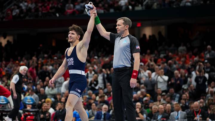 Penn State Nittany Lions wrestler Levi Haines reacts to defeating the Nebraska Cornhuskers' Christopher Minto during the NCAA Wrestling Championships at Rocket Arena. Penn State Nittany Lions wrestler Levi Haines reacts to defeating the Nebraska Cornhuskers' Christopher Minto during the NCAA Wrestling Championships at Rocket Arena.