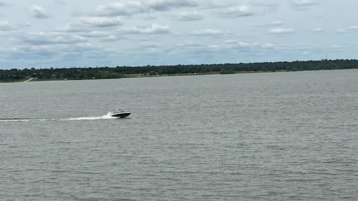 A boat races across Grapevine Lake where Ava Moore, 18, a 2024 graduate of Fort Worth Timber Creek and an Air Force basketball commit, was fatally struck by a jet ski while kayaking on Sunday. The driver of the jet ski fled the area with another male before authorities arrived. Grapevine PD and Texas Park and Wildlife are investigating and are asking for the public's help in identifying both suspects. A boat races across Grapevine Lake where Ava Moore, 18, a 2024 graduate of Fort Worth Timber Creek and an Air Force basketball commit, was fatally struck by a jet ski while kayaking on Sunday. The driver of the jet ski fled the area with another male before authorities arrived. Grapevine PD and Texas Park and Wildlife are investigating and are asking for the public's help in identifying both suspects.