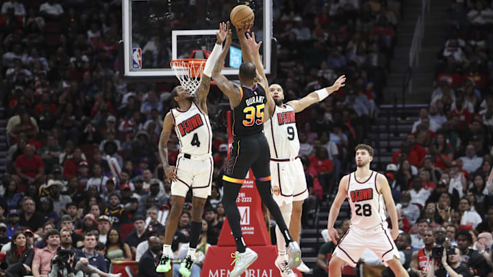 Mar 12, 2025; Houston, Texas, USA; Houston Rockets guard Jalen Green (4) and forward Dillon Brooks (9) defend against Phoenix Suns forward Kevin Durant (35) during the third quarter at Toyota Center. Mandatory Credit: Troy Taormina-Imagn Images Mar 12, 2025; Houston, Texas, USA; Houston Rockets guard Jalen Green (4) and forward Dillon Brooks (9) defend against Phoenix Suns forward Kevin Durant (35) during the third quarter at Toyota Center. Mandatory Credit: Troy Taormina-Imagn Images