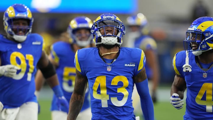 Dec 17, 2023; Inglewood, California, USA; Los Angeles Rams safety John Johnson III (43) celebrates after intercepting a pass against the Washington Commanders in the second half at SoFi Stadium. Mandatory Credit: Kirby Lee-Imagn Images