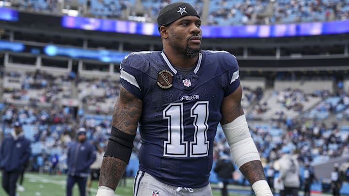 Dallas Cowboys linebacker Micah Parsons walks onto the field during the first quarter against the Carolina Panthers.