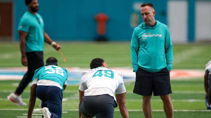 Miami Dolphins head coach Jeff Hafley speaks to tight end Seydou Traore (49) during rookie minicamp at Baptist Health Training Complex. Miami Dolphins head coach Jeff Hafley speaks to tight end Seydou Traore (49) during rookie minicamp at Baptist Health Training Complex.