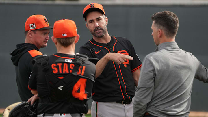 Feb 13, 2025; Scottsdale, AZ, USA; San Francisco Giants pitcher Justin Verlander (35) watches players work out in the bullpen during spring training camp. Feb 13, 2025; Scottsdale, AZ, USA; San Francisco Giants pitcher Justin Verlander (35) watches players work out in the bullpen during spring training camp.