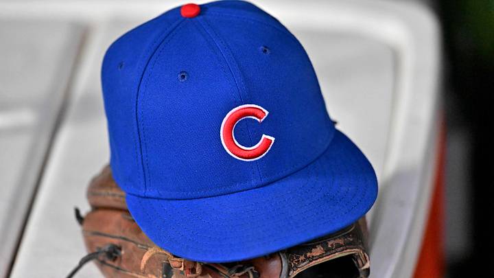 Mar 31, 2026; Chicago, Illinois, USA; A stock photo of a Chicago Cubs baseball hat and glove prior to a game against the Los Angeles Angels at Wrigley Field. Mar 31, 2026; Chicago, Illinois, USA; A stock photo of a Chicago Cubs baseball hat and glove prior to a game against the Los Angeles Angels at Wrigley Field.