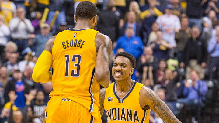 Apr 4, 2017; Indianapolis, IN, USA; Indiana Pacers forward Paul George (13) celebrates a three point basket and a lead over the Toronto Raptors with teammate guard Jeff Teague (44) the game at Bankers Life Fieldhouse. The Pacers beat the Raptors 108-90. Mandatory Credit: Trevor Ruszkowski-Imagn Images