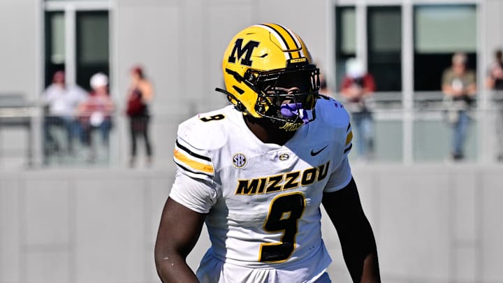 Oct 12, 2024; Amherst, Massachusetts, USA; Missouri Tigers defensive end Zion Young (9) lines up against the Massachusetts Minutemen during the second half at Warren McGuirk Alumni Stadium. Mandatory Credit: Eric Canha-Imagn Images Oct 12, 2024; Amherst, Massachusetts, USA; Missouri Tigers defensive end Zion Young (9) lines up against the Massachusetts Minutemen during the second half at Warren McGuirk Alumni Stadium. Mandatory Credit: Eric Canha-Imagn Images