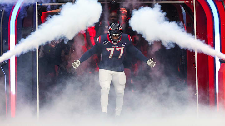 Dec 3, 2023; Houston, Texas, USA;Houston Texans offensive tackle George Fant (77) is introduced before playing against the Denver Broncos at NRG Stadium. Mandatory Credit: Thomas Shea-Imagn Images Dec 3, 2023; Houston, Texas, USA;Houston Texans offensive tackle George Fant (77) is introduced before playing against the Denver Broncos at NRG Stadium. Mandatory Credit: Thomas Shea-Imagn Images
