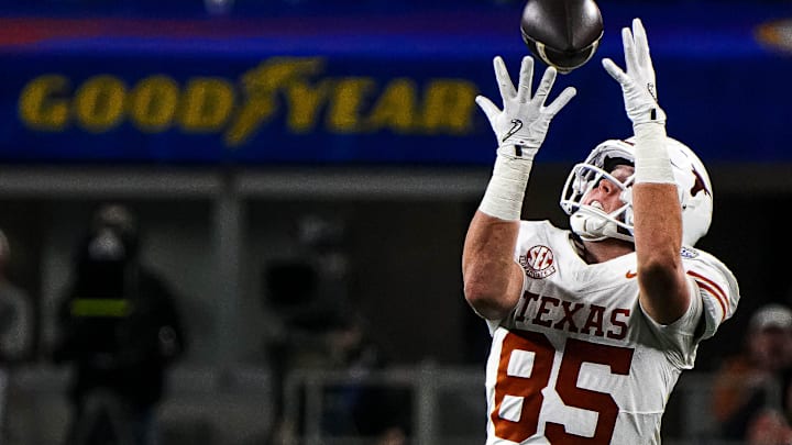 Texas Longhorns tight end Gunnar Helm (85) makes a catch during the College Football Playoff semifinal game against Ohio State in the Cotton Bowl at AT&T Stadium on Friday, Jan. 10, 2024 in Arlington, Texas.