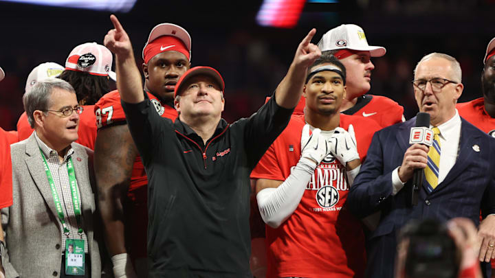 Dec 7, 2024; Atlanta, GA, USA; Georgia Bulldogs head coach Kirby Smart reacts after defeating the Texas Longhorns in overtime in the 2024 SEC Championship game at Mercedes-Benz Stadium. Mandatory Credit: Brett Davis-Imagn Images