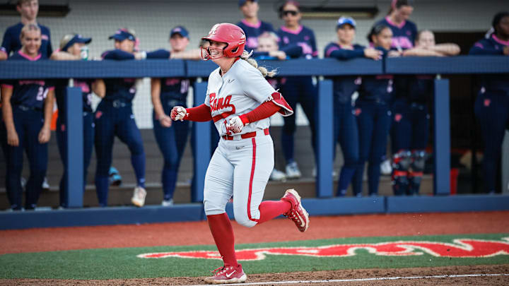 Brooke Wells celebrates a home run against Ole Miss