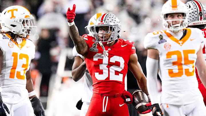 Ohio State running back TreVeyon Henderson (32) celebrates in the first half at Ohio Stadium on Saturday, Dec. 21, 2024 in Columbus, Ohio.