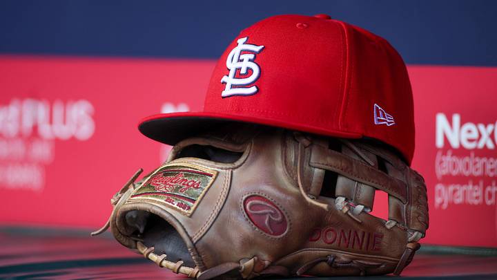 Apr 21, 2025; Atlanta, Georgia, USA; A St. Louis Cardinals hat and glove in the dugout against the Atlanta Braves in the first inning at Truist Park. Mandatory Credit: Brett Davis-Imagn Images Apr 21, 2025; Atlanta, Georgia, USA; A St. Louis Cardinals hat and glove in the dugout against the Atlanta Braves in the first inning at Truist Park. Mandatory Credit: Brett Davis-Imagn Images