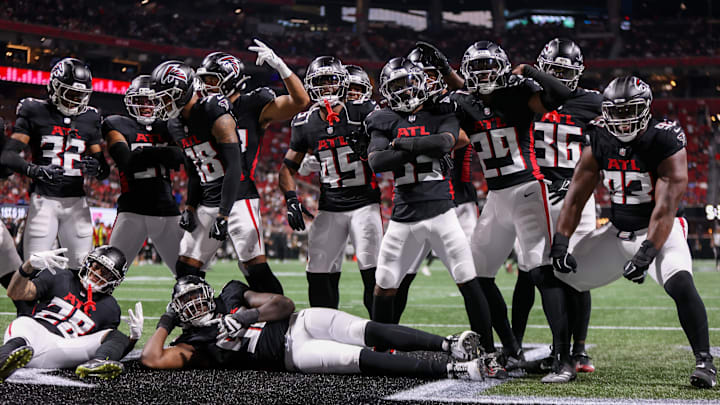 Aug 15, 2025; Atlanta, Georgia, USA; Atlanta Falcons defense celebrates after an interception by cornerback Natrone Brooks (35) against the Tennessee Titans in the second quarter at Mercedes-Benz Stadium. Mandatory Credit: Brett Davis-Imagn Images
