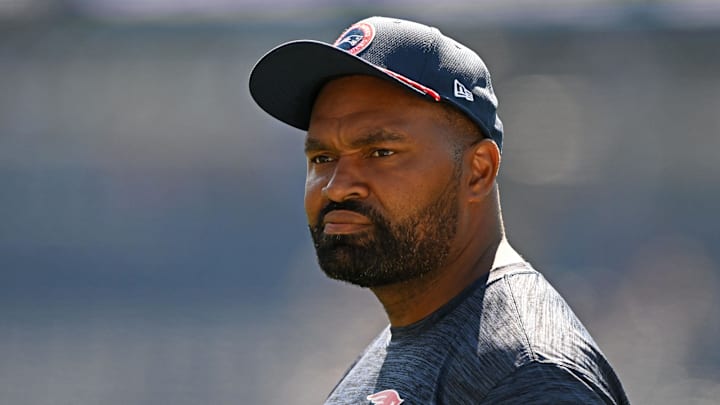 Sep 15, 2024; Foxborough, Massachusetts, USA; New England Patriots head coach Jerod Mayo watches warmups before a game against the Seattle Seahawks at Gillette Stadium.