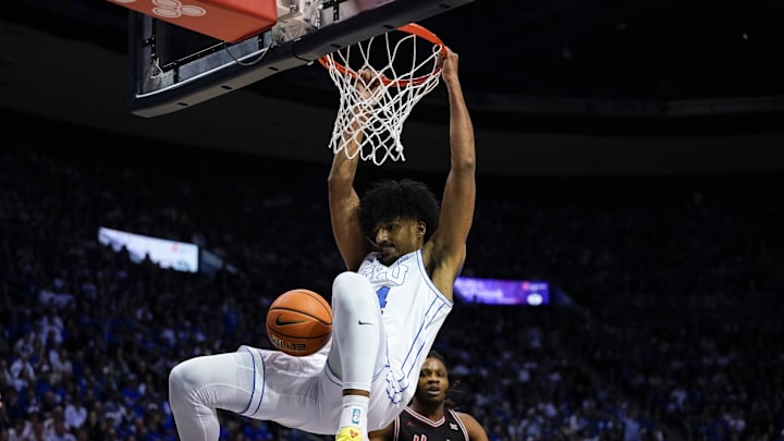 Feb 7, 2026; Provo, Utah, USA; BYU Cougars center Abdullah Ahmed (34) dunks during the first half against the Houston Cougars at Marriott Center. Mandatory Credit: Aaron Baker-Imagn Images