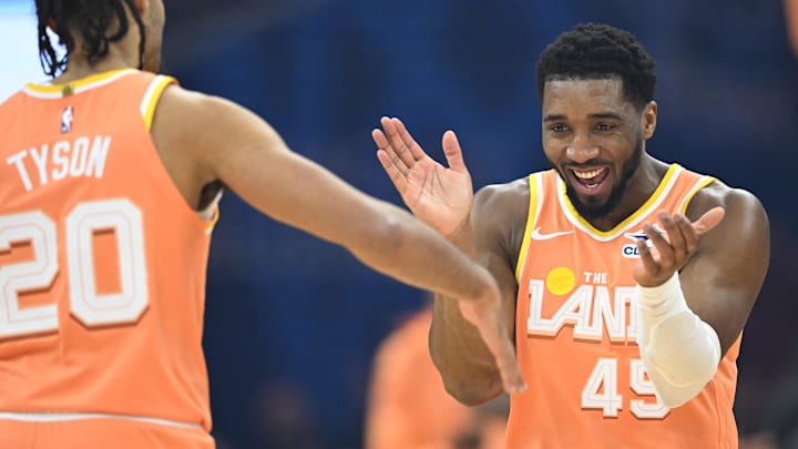 Jan 26, 2026; Cleveland, Ohio, USA; Cleveland Cavaliers guard Jaylon Tyson (20) and guard Donovan Mitchell (45) celebrate in the first quarter against the Orlando Magic at Rocket Arena. Mandatory Credit: David Richard-Imagn Images Jan 26, 2026; Cleveland, Ohio, USA; Cleveland Cavaliers guard Jaylon Tyson (20) and guard Donovan Mitchell (45) celebrate in the first quarter against the Orlando Magic at Rocket Arena. Mandatory Credit: David Richard-Imagn Images
