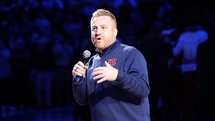 Dec 3, 2025; Auburn, Alabama, USA; Auburn Tigers head football coach Alex Golesh is introduced during the first half of a basketball game between the Auburn Tigers and NC State Wolfpack at Neville Arena. Mandatory Credit: John Reed-Imagn Images