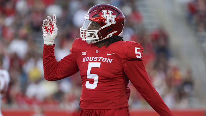Sep 28, 2024; Houston, Texas, USA; Houston Cougars defensive lineman Keith Cooper Jr. (5) reacts after a play during the first half against the Iowa State Cyclones at TDECU Stadium. Mandatory Credit: Troy Taormina-Imagn Images