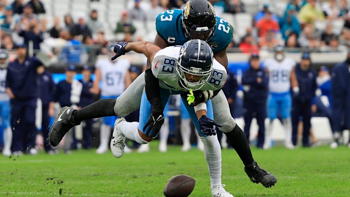 Jacksonville Jaguars linebacker Foyesade Oluokun (23) breaks up a pass intended for Tennessee Titans wide receiver Tyler Boyd (83) during the fourth quarter Sunday, Dec. 29, 2024 at EverBank Stadium in Jacksonville, Fla. The Jaguars held off the Titans 20-13. [Corey Perrine/Florida Times-Union]