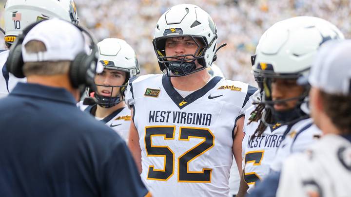 Sep 5, 2026; Morgantown, West Virginia, USA; West Virginia Mountaineers offensive lineman Nick Krahe (52) during a huddle during the second quarter against the Coastal Carolina Chanticleers at Milan Puskar Stadium. Mandatory Credit: Ben Queen-Imagn Images