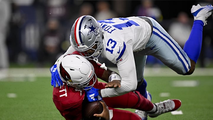 Nov 3, 2025; Arlington, Texas, USA; Dallas Cowboys defensive end Dante Fowler Jr. (13) sacks Arizona Cardinals quarterback Jacoby Brissett (7) during the game between the Dallas Cowboys and the Arizona Cardinals at AT&T Stadium. Mandatory Credit: Jerome Miron-Imagn Images