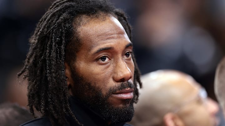 Kawhi Leonard #2 of the Los Angeles Clippers looks on from the bench against the Sacramento Kings.