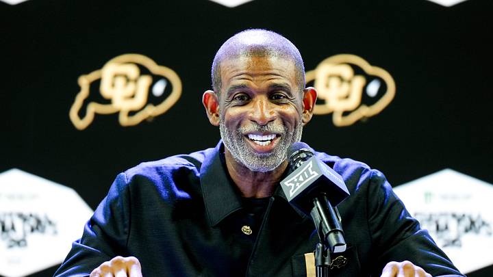 Jul 7, 2026; Frisco, TX, USA; Colorado head coach Deion Sanders speaks to reporters during Big 12 Conference Football Media Days at The Star. Mandatory Credit: Raymond Carlin III-Imagn Images Jul 7, 2026; Frisco, TX, USA; Colorado head coach Deion Sanders speaks to reporters during Big 12 Conference Football Media Days at The Star. Mandatory Credit: Raymond Carlin III-Imagn Images