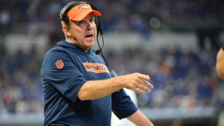 Aug 11, 2024; Indianapolis, Indiana, USA; Denver Broncos Head Coach Sean Payton shares a word with a referee during the second half against the Indianapolis Colts  at Lucas Oil Stadium. Mandatory Credit: Marc Lebryk-USA TODAY Sports