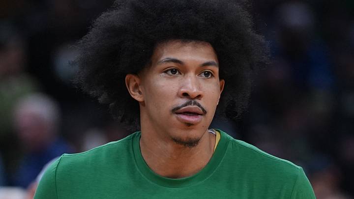 Feb 8, 2026; Boston, Massachusetts, USA; Boston Celtics guard Ron Harper Jr. (13) warms up before the start of the game against the New York Knicks at TD Garden. Mandatory Credit: David Butler II-Imagn Images