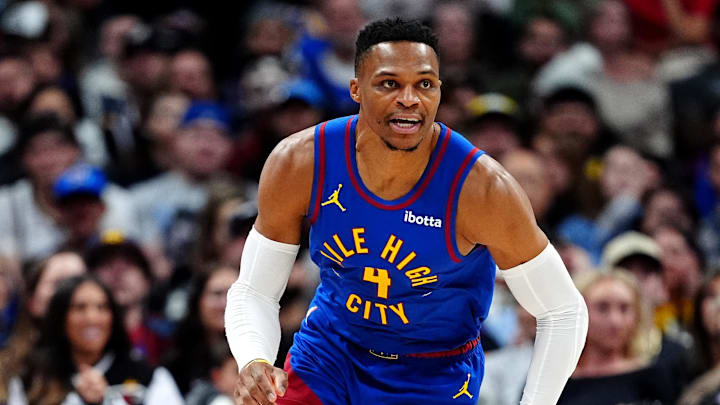 Nov 8, 2024; Denver, Colorado, USA; Denver Nuggets guard Russell Westbrook (4) during the first quarter against the Miami Heat at Ball Arena. Mandatory Credit: Ron Chenoy-Imagn Images