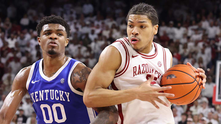 Arkansas Razorbacks guard Darius Acuff Jr (5) drives against Kentucky Wildcats guard Otega Oweh (00) during the second half at Bud Walton Arena. Kentucky won 85-77. Mandatory Credit: Nelson Chenault-Imagn Images Arkansas Razorbacks guard Darius Acuff Jr (5) drives against Kentucky Wildcats guard Otega Oweh (00) during the second half at Bud Walton Arena. Kentucky won 85-77. Mandatory Credit: Nelson Chenault-Imagn Images
