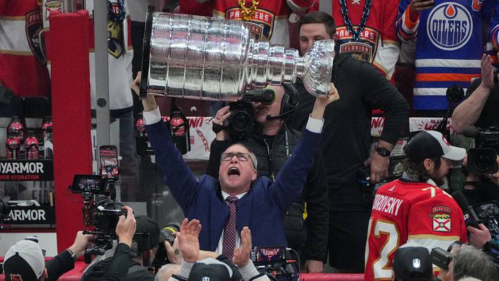 Jun 24, 2024; Sunrise, Florida, USA; Florida Panthers head coach Paul Maurice hoists the Stanley Cup after defeating Edmonton Oilers in game seven of the 2024 Stanley Cup Final at Amerant Bank Arena. Mandatory Credit: Jim Rassol-USA TODAY Sports Jun 24, 2024; Sunrise, Florida, USA; Florida Panthers head coach Paul Maurice hoists the Stanley Cup after defeating Edmonton Oilers in game seven of the 2024 Stanley Cup Final at Amerant Bank Arena. Mandatory Credit: Jim Rassol-USA TODAY Sports