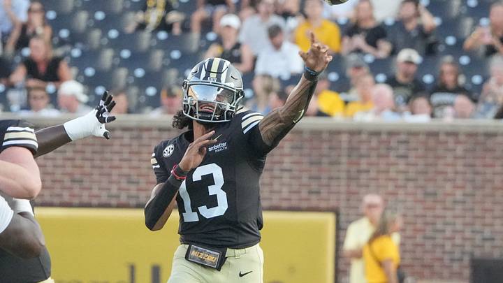 Sep 19, 2026; Columbia, Missouri, USA; Missouri Tigers quarterback Austin Simmons (13) throws a pass against the Troy Trojans during the first half of the game at Faurot Field at Memorial Stadium. Mandatory Credit: Denny Medley-Imagn Images Sep 19, 2026; Columbia, Missouri, USA; Missouri Tigers quarterback Austin Simmons (13) throws a pass against the Troy Trojans during the first half of the game at Faurot Field at Memorial Stadium. Mandatory Credit: Denny Medley-Imagn Images