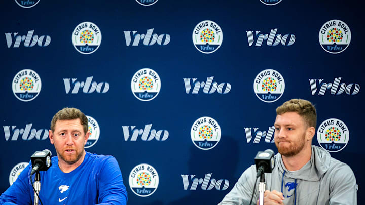 Kentucky offensive coordinator Liam Coen, left, speaks during a news conference with quarterback Will Levins for the Vrbo Citrus Bowl, Wednesday, Dec. 29, 2021, at the Rosen Plaza Hotel in Orlando, Fla.

211229 Iowa Kentucky Presser 011 Jpg