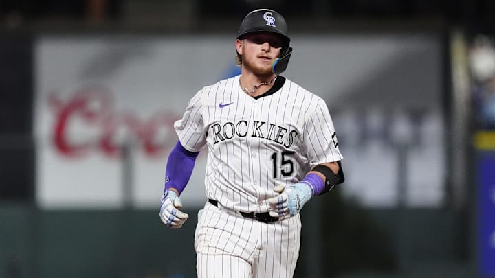 Sep 2, 2025; Denver, Colorado, USA; Colorado Rockies catcher Hunter Goodman (15) runs off a two run home run in the seventh inning against the San Francisco Giants at Coors Field. 