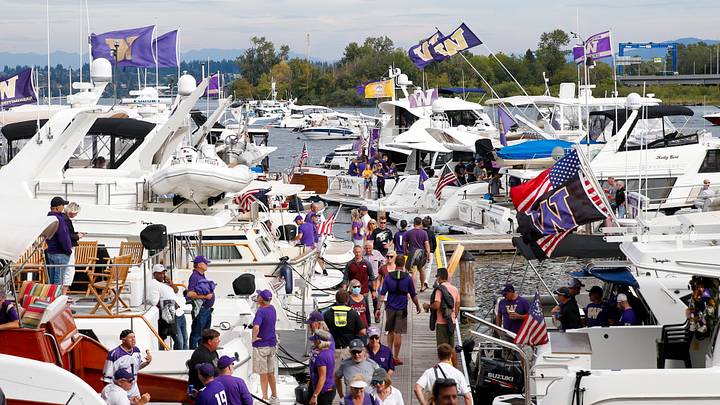 Sep 4, 2021; Seattle, Washington, USA; Fans sailgate on boats in Lake Washington before a game between the Washington Huskies and Montana Grizzlies at Alaska Airlines Field at Husky Stadium. Mandatory Credit: Joe Nicholson-USA TODAY Sports