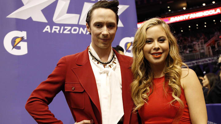 Jan 27, 2015; Phoenix, AZ, USA; NBC correspondents Tara Lipinski (right) and Johnny Weir (left) in attendance during media day for Super Bowl XLIX at US Airways Center. Jan 27, 2015; Phoenix, AZ, USA; NBC correspondents Tara Lipinski (right) and Johnny Weir (left) in attendance during media day for Super Bowl XLIX at US Airways Center.