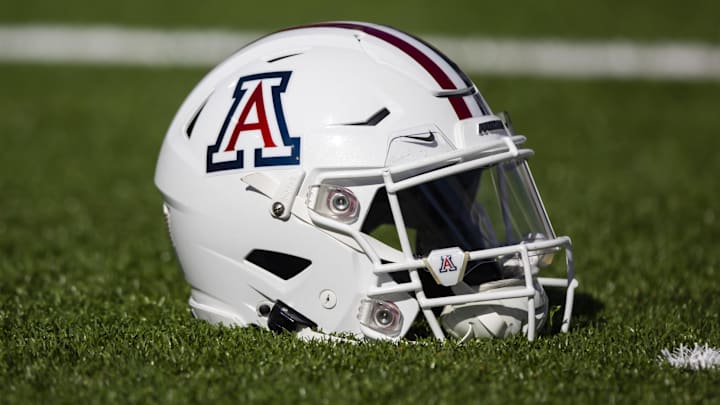 Nov 25, 2022; Tucson, Arizona, USA; Detailed view of an Arizona Wildcats helmet on the field during the Territorial Cup at Arizona Stadium. Mandatory Credit: Mark J. Rebilas-Imagn Images