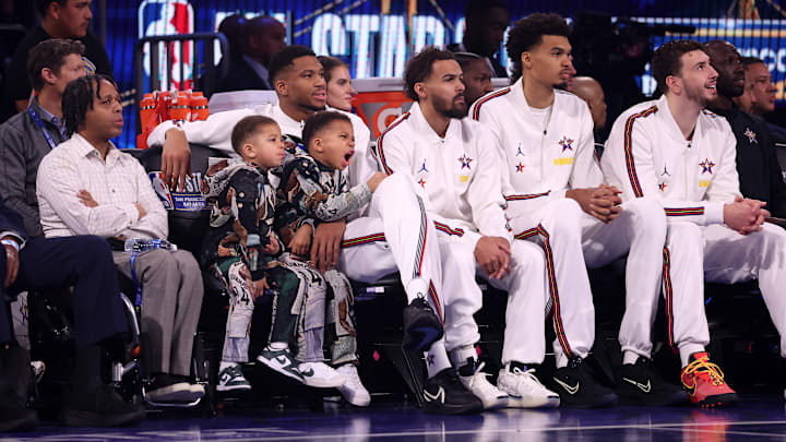 Trae Young and the Team Chuck's Global Stars look on during the 74th NBA All-Star Game.