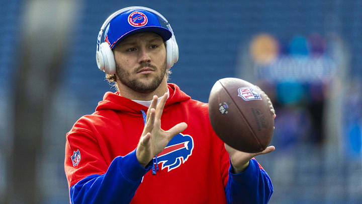 Buffalo Bills quarterback Josh Allen (17) participates in pregame warmups against the Seattle Seahawks at Lumen Field.