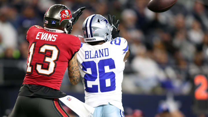 Dallas Cowboys cornerback DaRon Bland (26) defends a pass against Tampa Bay Buccaneers wide receiver Mike Evans (13) in the third quarter at AT&T Stadium. Dallas Cowboys cornerback DaRon Bland (26) defends a pass against Tampa Bay Buccaneers wide receiver Mike Evans (13) in the third quarter at AT&T Stadium.