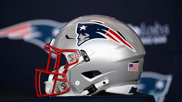 Jan 17, 2024; Foxborough, MA, USA; A New England Patriots helmet sits on a table prior to a press conference at Gillette Stadium. Mandatory Credit: Eric Canha-Imagn Images