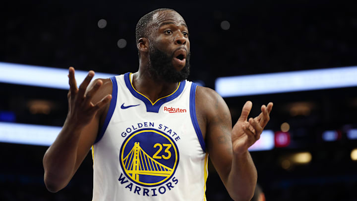 Dec 18, 2025; Phoenix, Arizona, USA; Golden State Warriors forward Draymond Green (23) reacts against the Phoenix Suns in the second half at Mortgage Matchup Center. Mandatory Credit: Mark J. Rebilas-Imagn Images