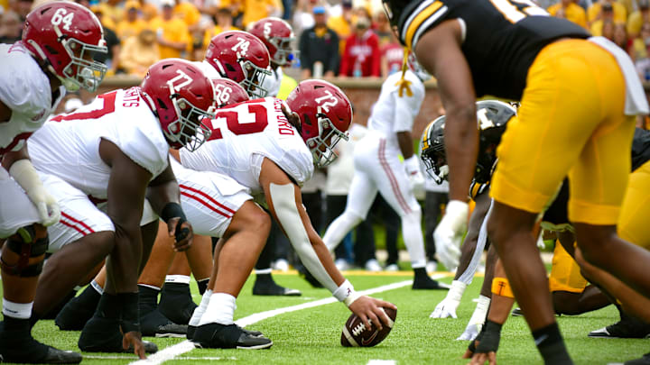 Oct 11, 2025; Columbia, MO, USA; Alabama Crimson Tide center Parker Brailsford (72) prepares to snap the ball against the Missouri Tigers at Faurot Field at Memorial Stadium.