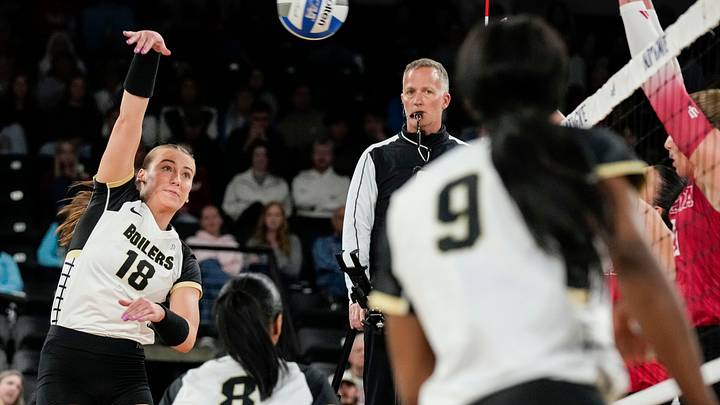 Purdue Boilermakers outside hitter Addy Tindall (18) hits the ball. Purdue Boilermakers outside hitter Addy Tindall (18) hits the ball.